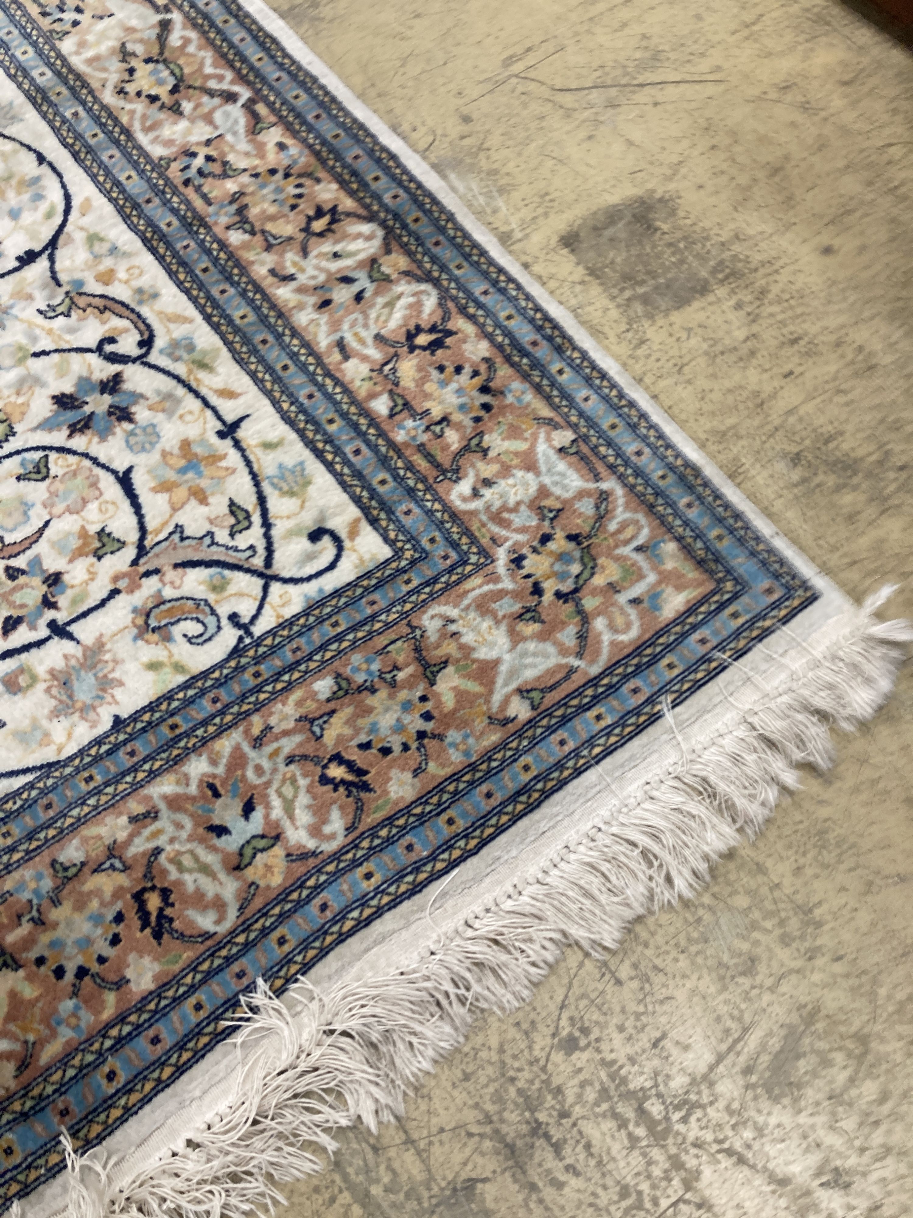 A North West Persian design ivory ground rug, 210 x 136cm